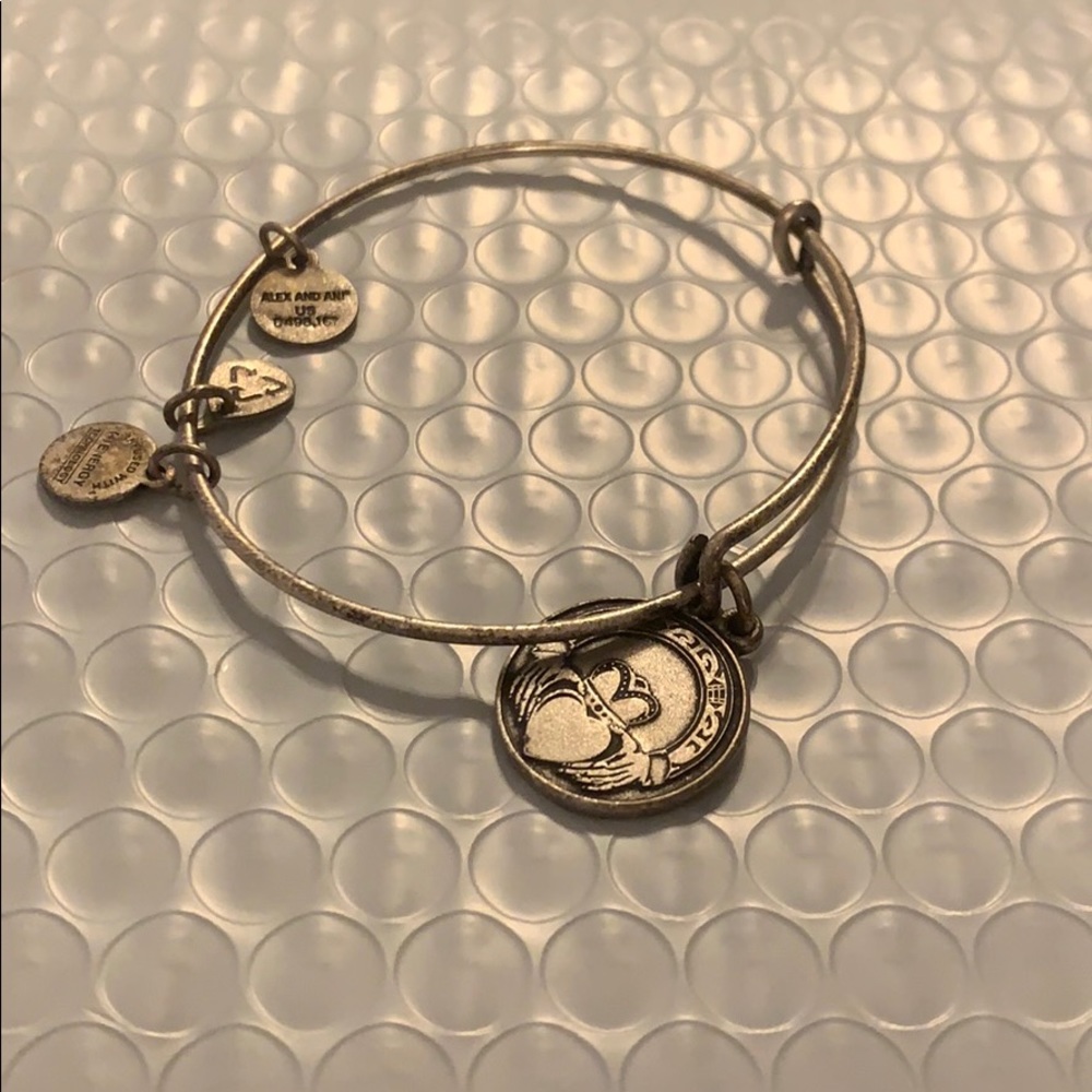 Alex and Ani bracelet with claddagh ring charm